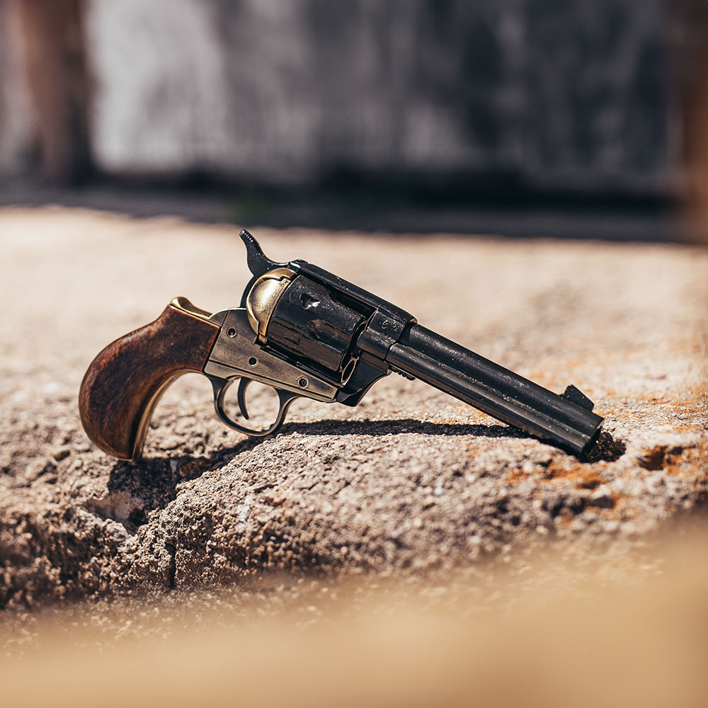 thunderer revolver replica pistol on stone