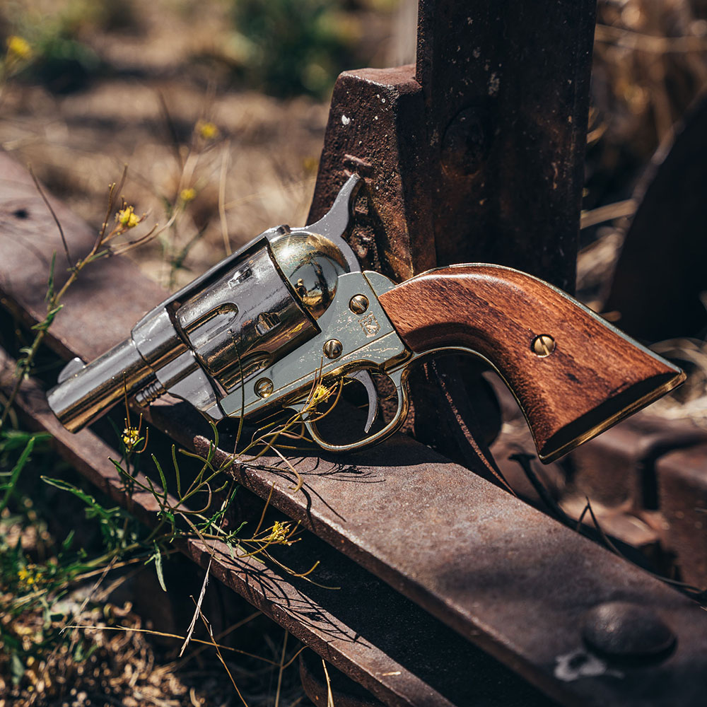 non firing 1873 45 caliber short revolver on iron rod