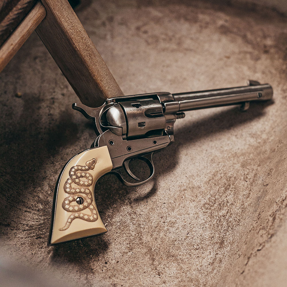 replica 45 peacemaker revolver on the floor