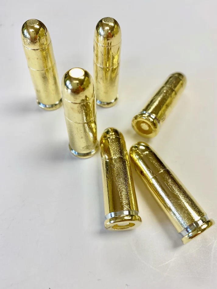 6 dummy bullets in a group