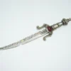 Top view of toledo dagger embelleshed blade decorative grip and pommel