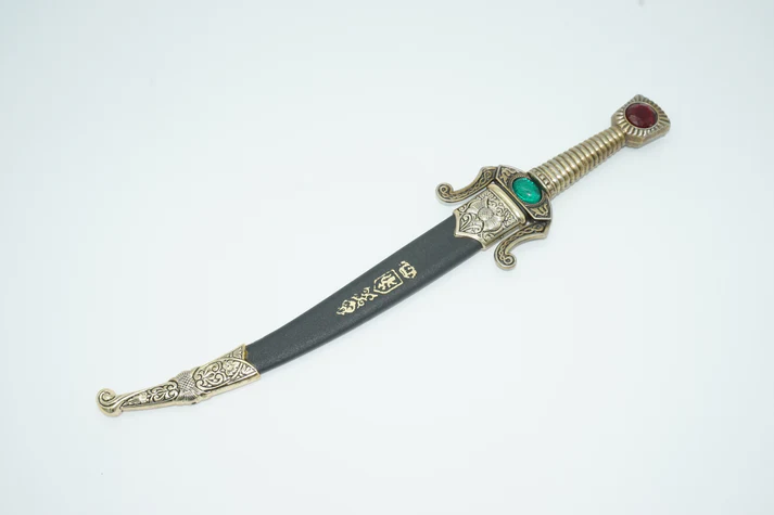 Top view of Seville Court Dagger sheathed in black sheath.